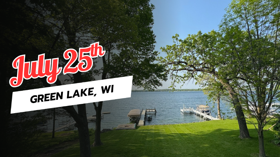 View of a lake with several boats docked.